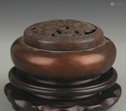 A BRONZE ROUND AROMATHERAPY BURNER