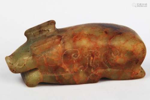 A WARRING STATES PERIOD STYLE OLD JADE PIG