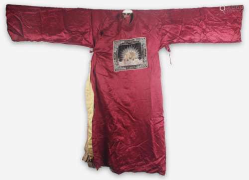 A FINE RED COLOR EMBROIDERED ROBE