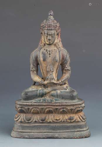 A BRONZE FIGURE OF SEATED DEITY