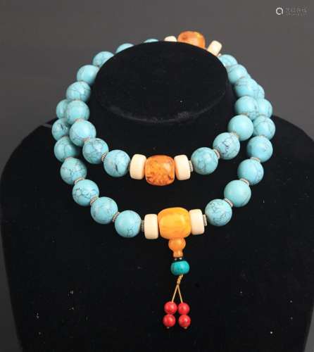 A TURQUOISE WITH AMBER NECKLACE