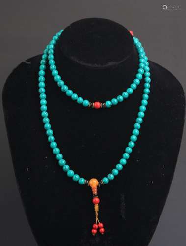A TURQUOISE WITH CORAL NECKLACE