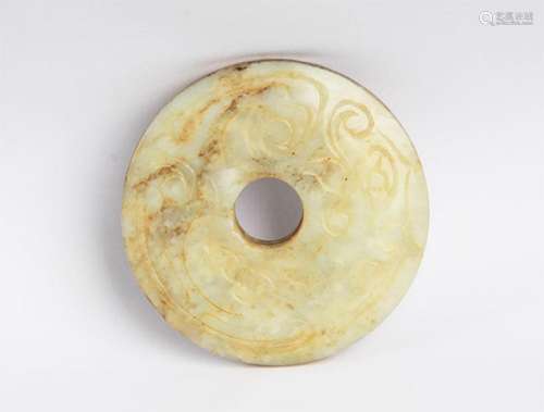 A ROUND DRAGON CARVING JADE