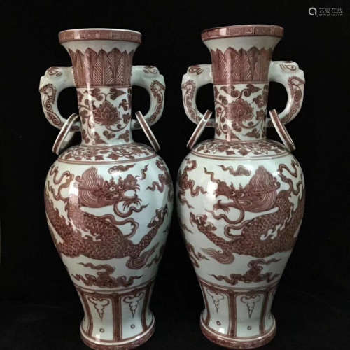 A PAIR OF DRAGON PATTERN HONGWU RED GLAZED DOUBLE-EAR VASES