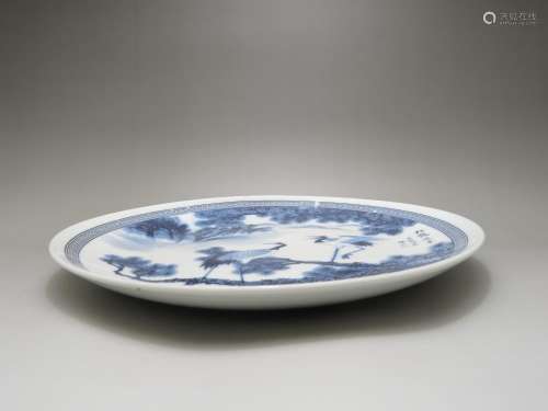 A BLUE AND WHITE PLATE, 20TH CENTURY
