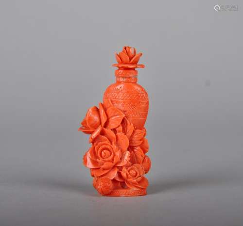 A CARVED CORRAL SNUFF BOTTLE, QING DYNASTY