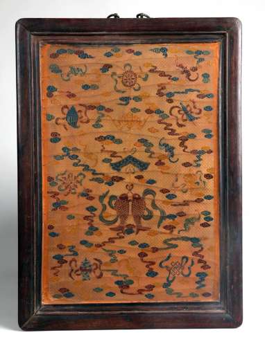 A LACQUERED WALL PLAQUE WITH HUANGHUALI FRAME, QING DYNASTY.