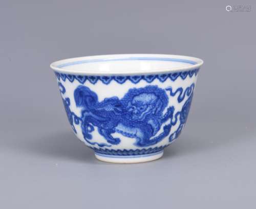 A BLUE AND WHITE 'MYTHICAL BEAST' CUP, YONGZHENG MARK