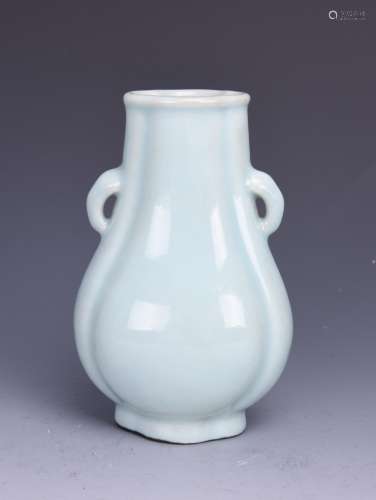 A CELADON-GLAZED TWO-HANDLED VASE, QIANLONG MARK AN OF THE PERIOD