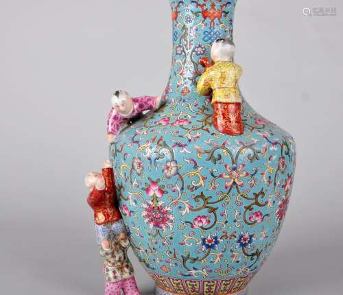 A TURQUOIS GROUND FAMILLE ROSE VASE, QIANLONG MARK AND POSSIBLY OF THE PERIOD