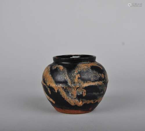 A RUSSET-SPLASHED BLACK-GLAZED JAR, TANG DYNASTY