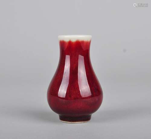 A SMALL COPPER-RED GLAZED JUN VASE, QING DYNASTY