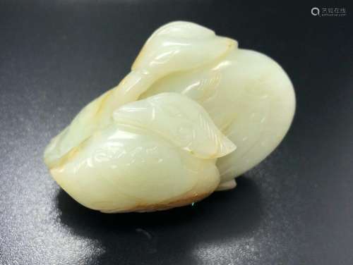 A WHITE AND RUSSET JADE DOUBLE DUCKS