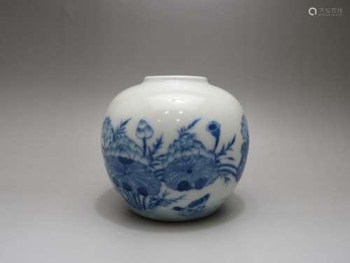 A SMALL BLUE AND WHITE JAR