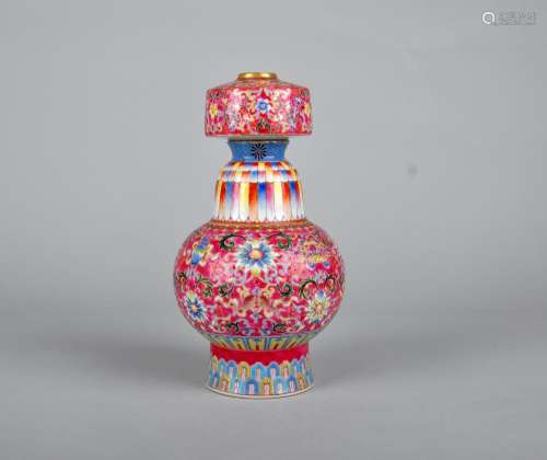 A FAMILLE ROSE 'EIGHT AUSPICIOUS' VASE, DAOGUANG MARK, QING DYNASTY