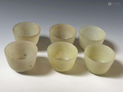 SIX ANTIQUE JADE CAPS.