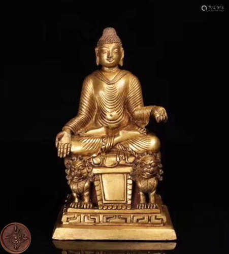 A GILT BRONZE MOLDED SAKYAMUNI BUDDHA STATUE