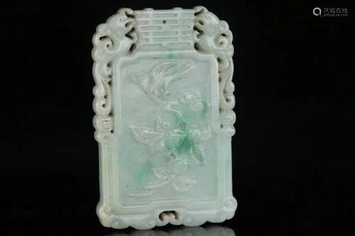 A JADEITE CARVED PENDANT