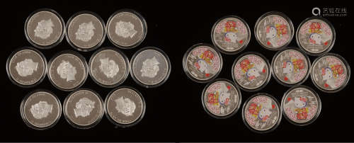 2014年英国皇家铸币局铸造发行“Hello Kitty 40周年”1盎司纯银纪念币一组10套10枚全