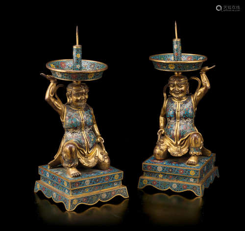 18th/19th century A PAIR OF CLOISONNE ENAMEL AND GILT-BRONZE 'FOREIGNER' CANDLE PRICKETS