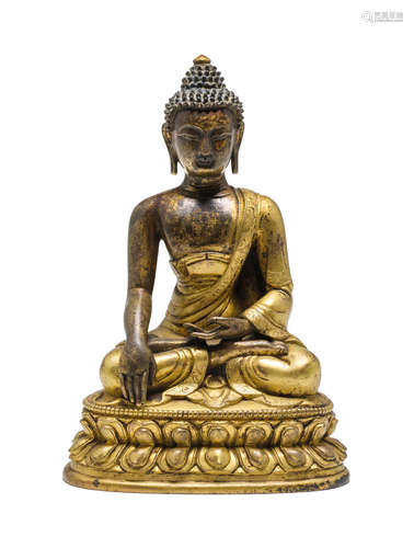 17th/18th century A GILT-BRONZE FIGURE OF SHAKYAMUNI BUDDHA