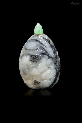 1750-1850 A black and white jade 'dragons and clouds' snuff bottle