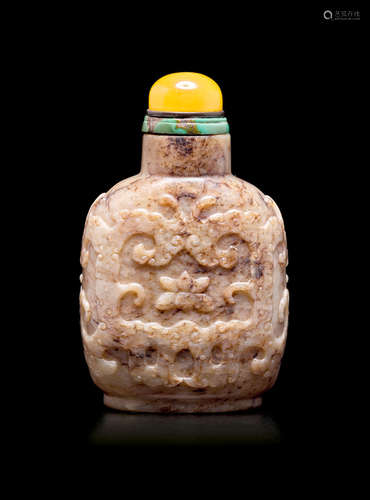 1820-1930 A 'chicken bone' jade 'lotus' snuff bottle