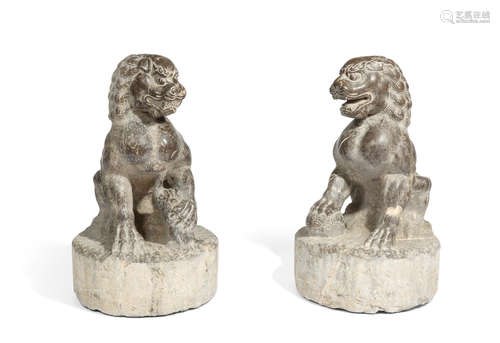 Ming dynasty or earlier A PAIR OF LIMESTONE GUARDIAN LIONS