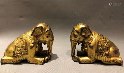 Gilt Bronze Kneeling Elephants