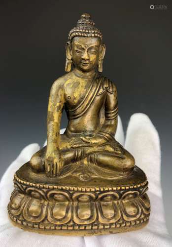 A Small Bronze Figure Of Buddha
