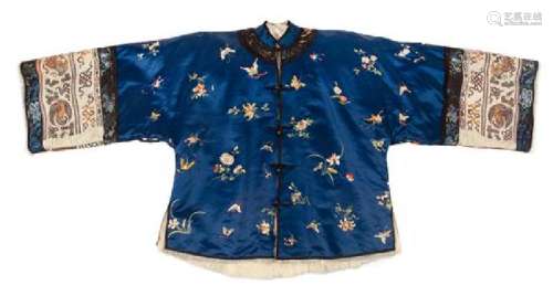 * A Chinese Embroidered Silk Blue Ground Lady's Winter
