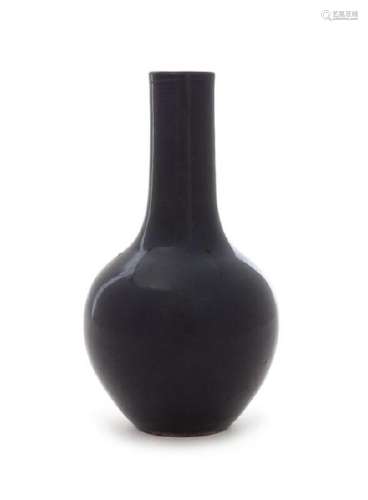 * A Chinese Dark Aubergine Glazed Porcelain Bottle Vase