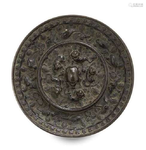 A Bronze 'Beast and Grapevine' Mirror Diameter 5 1/2