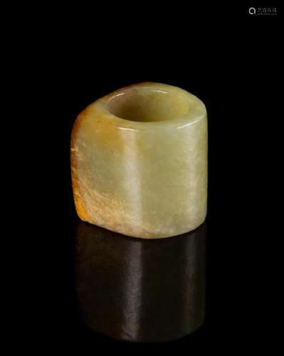 A Celadon and Russet Jade Archer's Ring Length 1 1/8