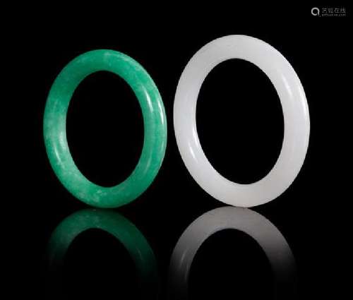 Two Jadeite Bangles Diameter of larger 3 3/8 inches.