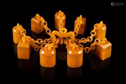 * A Set of Nine Carved Yellow Soapstone Seals Height of