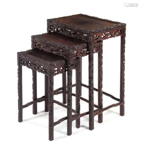 A Carved Hardwood Nesting Table Height 27 3/4 x width