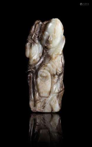 * A Black and White Jade Figure of a Standing Immortal