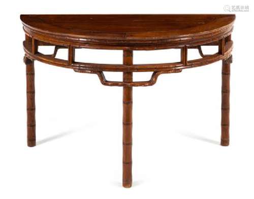 * A Chinese Hardwood 'Bamboo-Motif' Demi-Lune Console
