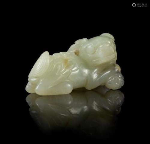 * A Pale Celadon Jade Figure of a Fu Lion Length 1 7/8