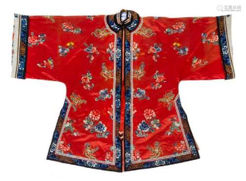 * A Chinese Red Ground Embroidered Silk Lady's Robe and