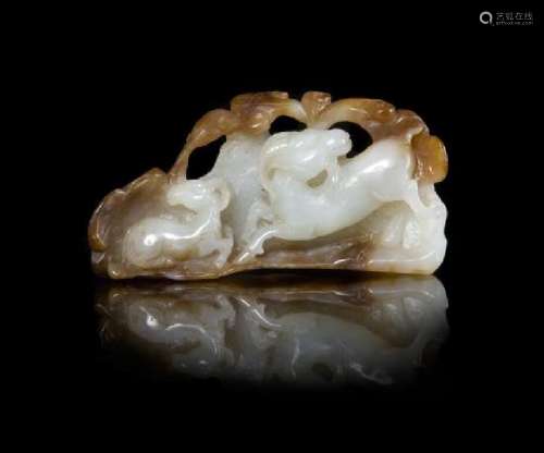 A Carved Russet and White Jade Figural Group of Double