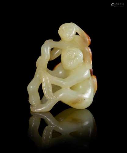A Yellow and Russet Jade Monkey Group Height 2 inches.