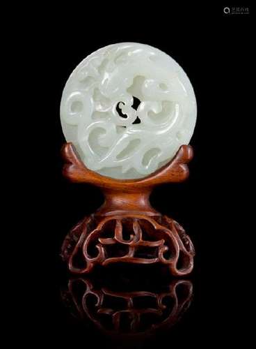 * A White Jade 'Dragon' Bi Disc Diameter 2 1/4 inches.