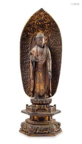 * A Japanese Gilt Lacquered Wood Figure of Buddha