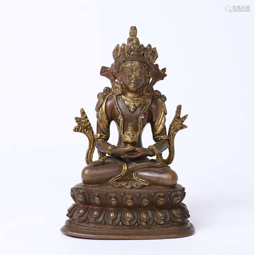 TIBETAN PARTLY GILT BRONZE SEATED MEDICINE BUDDHA