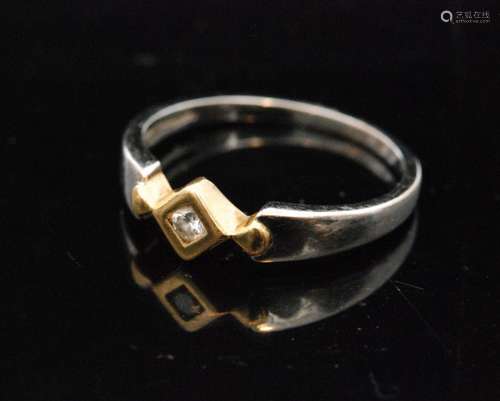 A modern 18ct white and yellow gold diamond ring