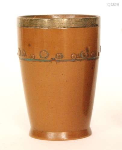 A late 19th Century Doulton Lambeth Silicon ware 'coopered' beaker with a silver collar