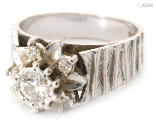 A 1970s 18ct white gold diamond flower head ring