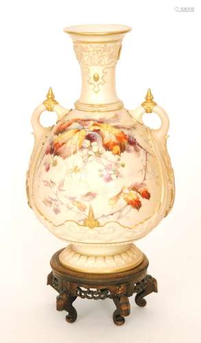 A large late 19th Century Royal Worcester twin handled shape 1553 blush ivory vase decorated with autumnal leaves